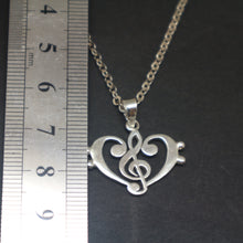 Load image into Gallery viewer, Treble Clef Bass Clef Music Heart Necklace
