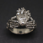 Skull Hand Holding Heart Claddagh Ring